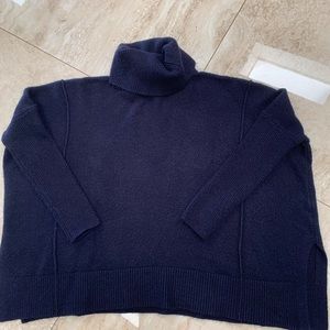 Oversized blue sweater.